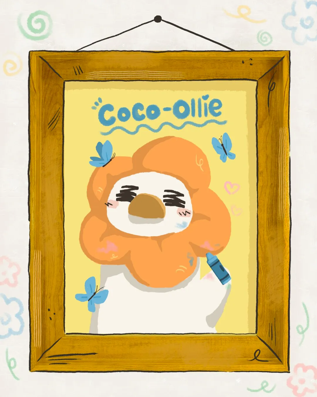 A framed portrait of Coco-Ollie